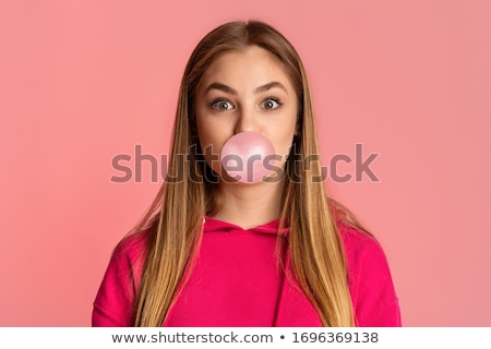 Stockfoto: Girl With Pink Bubble Of Chewing Gum