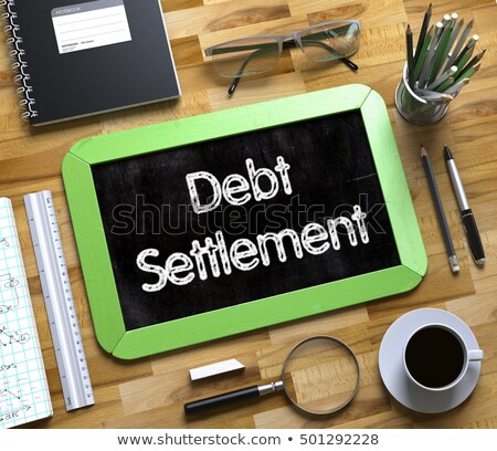 [[stock_photo]]: Debt Settlement Concept On Small Chalkboard 3d