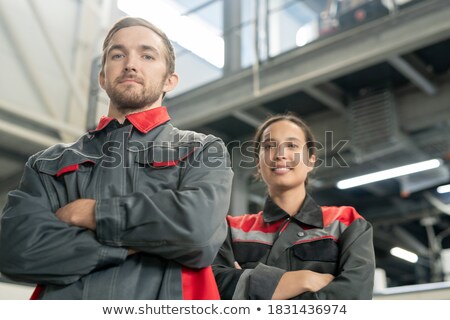 Confident Young Cross Armed Engineer Of Large Modern Factory Stockfoto © Pressmaster