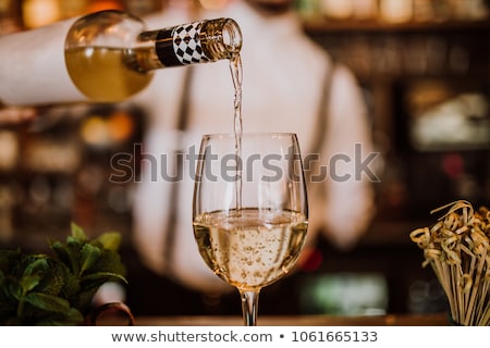 Stok fotoğraf: View At Young Man Tasting White Wine