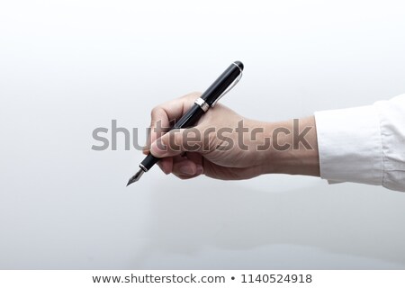 Сток-фото: Man Holding Fountain Pen In Hand Isolated On White