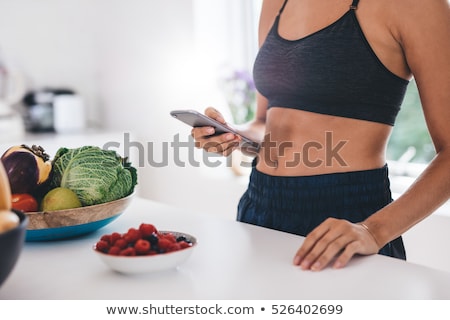 Сток-фото: Woman Eating Fruit In Underwear