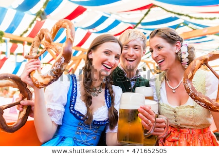 Smiling Woman Holding Oktoberfest Beer Stockfoto © Kzenon
