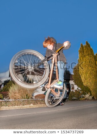 Stock photo: Young Boy With Dirtbike In Halfpipe