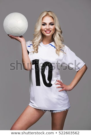 ストックフォト: Smiling Fit Girl In White Bikini Holding Football