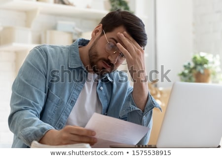 Foto stock: Business Man Looking Surprised