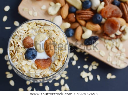 ストックフォト: Oat Flakes With Raisins And White Yogurt