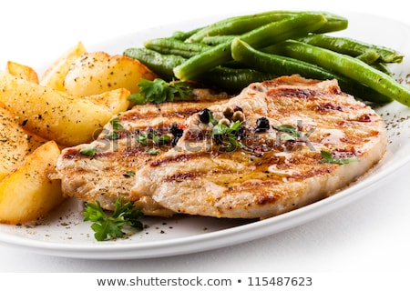 Foto stock: Pork Chop And Baked Beans