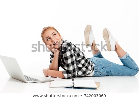 Foto stock: Side View Of Pensive Ginger Woman In Shirt And Jeans