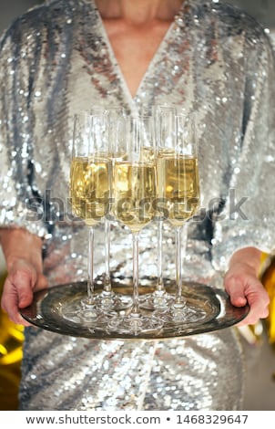 Zdjęcia stock: Close Up Of Shiny Glasses Of Champagne Over Party Background