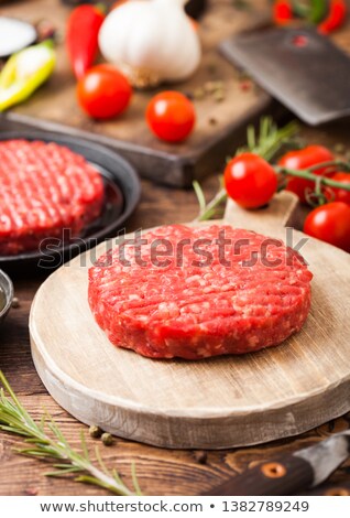 Foto stock: Fresh Raw Minced Homemade Farmers Grill Beef Burgers In Frying Pan With Spices And Herbs And Meat Ha