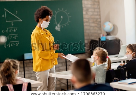 Сток-фото: Happy Student Girls With Tests At Lecture Hall