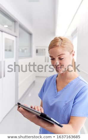 Foto stock: Nurses Using A Computer