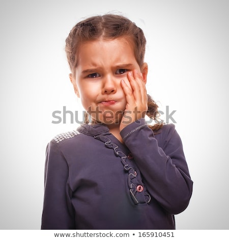 Foto stock: Children Kid With Tooth Ache And Finger In Pain Teeth