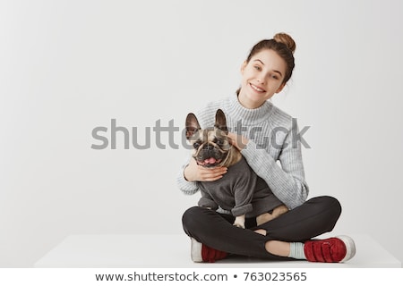 Foto stock: Portrait Of Young Woman Sitting In Lotus Position