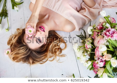 Stock foto: Young Beauty Womans Face With Bouquet Of Natural Flowers