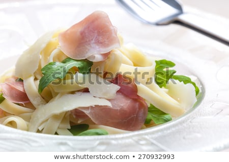 Foto stock: Tagliatelle With Ruccolla And Prosciutto