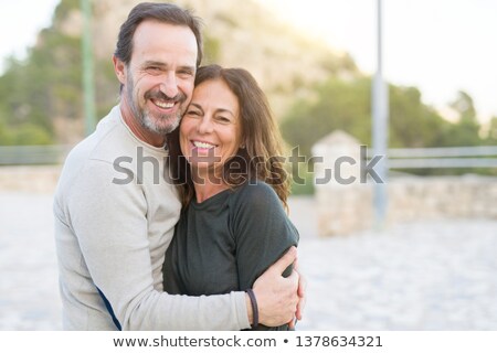 Stockfoto: Happy Senior Couple Drinking At The Park