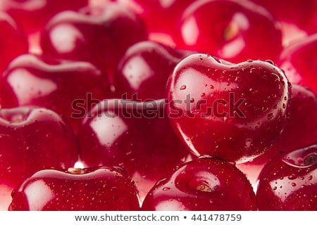 Foto stock: Cherry Background With Cherry In Form Of Heart Ripe Fresh Rich Cherries With Drops Of Water Macro