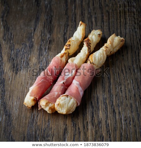 Foto stock: Slice Of Prosciutto On Crispy Bread