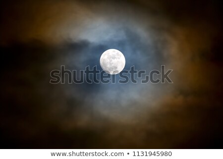 Stockfoto: Storm Clouds Breaking For The Full Moon