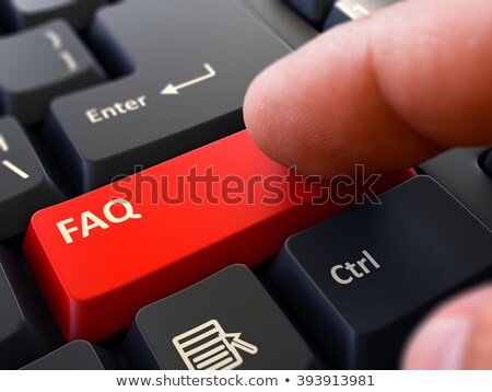 Foto stock: Finger Presses Red Keyboard Button Faq