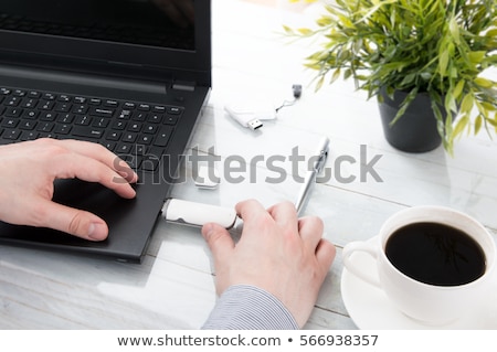 Foto stock: Man Connecting 5g Modem To Laptop