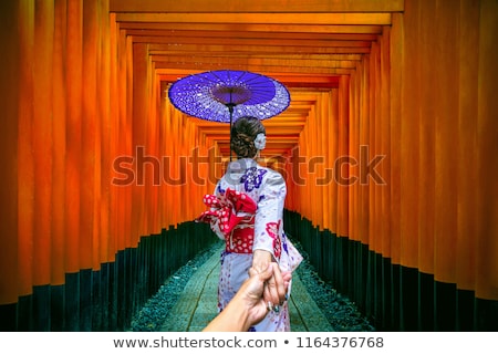 Stok fotoğraf: Image Of Young Geisha Woman In Traditional Japanese Kimono Smili