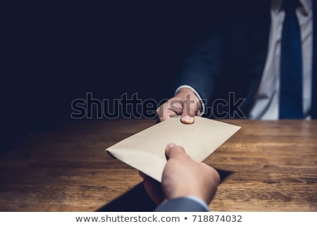 Foto stock: Businessman Receive An Envelope For Bribing Money Corruption Of