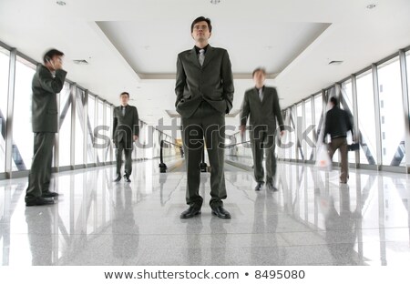 Imagine de stoc: Identical Men On Footbrige 2