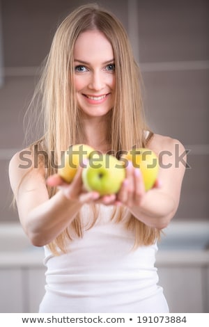 Woman Holding Three Apples Stok fotoğraf © bezikus