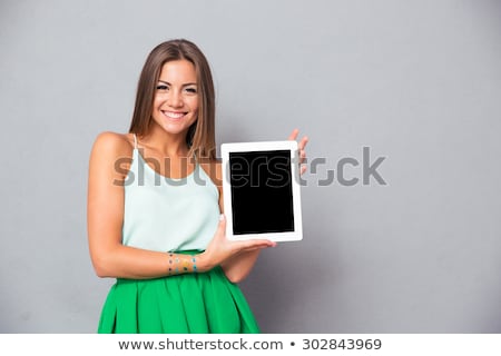 Сток-фото: Woman Showing Tablet Computer