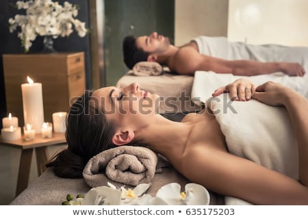 Beautiful Woman Lying With Candles Stockfoto © Kzenon