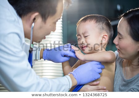 Zdjęcia stock: Mother And Her Little Son On Consultation Of Dentist