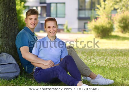 ストックフォト: Happy Friendship Day Two Boy Lying On Green Grass And Looking Up