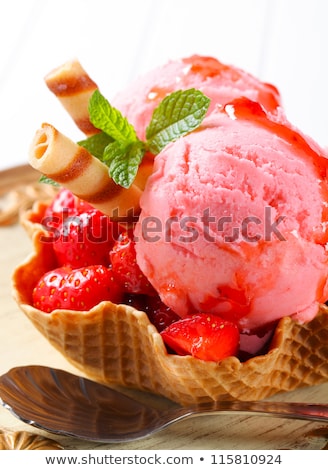 Stock fotó: Ice Cream With Strawberry Coulis