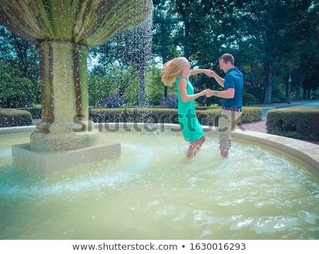 Сток-фото: Beautiful Young Couple At The Fountain