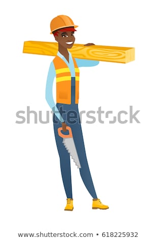 [[stock_photo]]: African Carpenter Holding Saw And Wooden Board