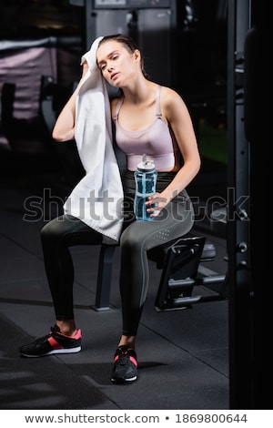 Stok fotoğraf: Tired Sportswoman With Towel