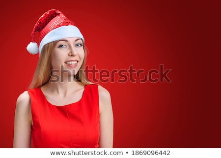Stok fotoğraf: Portrait Of Beautiful Young Christmas Woman Posing Wearing Santa