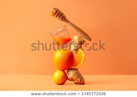Stock photo: Honey In Glass Jars And A Ginger Root