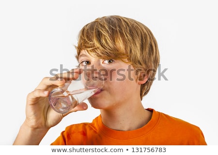 Foto stock: Portrait Of Attractive Caucasian Teenage Boy Drinking Water