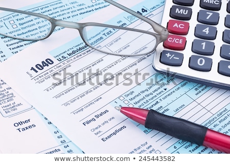 [[stock_photo]]: Calculator On 2014 Form 1040
