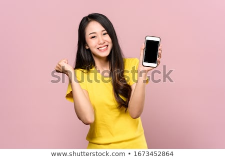 Stock photo: Young Asian Happy Traveler Gesturing