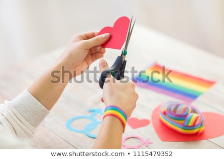 [[stock_photo]]: Hands Making Heart Decoration For Gay Party