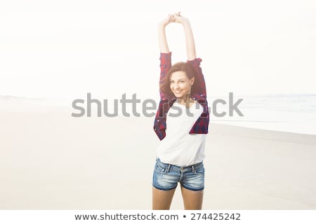 Foto stock: Portrtait Of A Happy Girl At The Beach Enjoying The Life