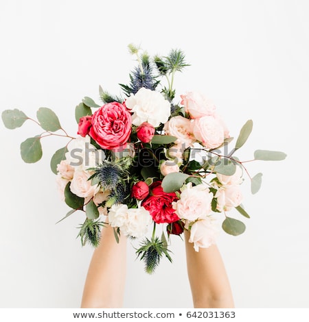 Foto stock: Stylish Woman Holding Roses Flower