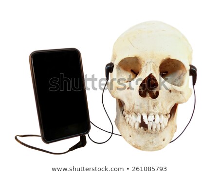 Zdjęcia stock: Human Skull Listening Music On Mobile Device