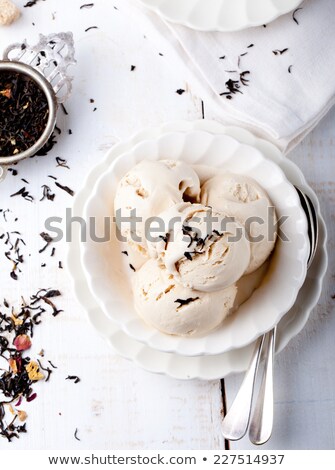 Zdjęcia stock: Ice Cream With Earl Grey Tea Flavor In White Ceramic Bowl