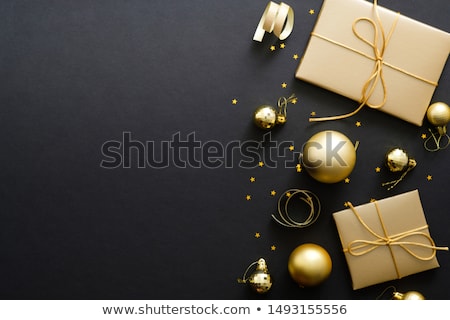 Stock photo: Baubles And Gifts On Black Desk